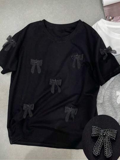 Calvaya 大码纯色圆领短袖 T 恤，带蝴蝶结装饰，休闲风格