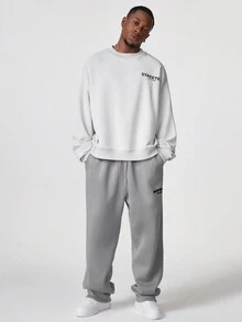 Manfinity RebelGame Pantalón de chándal holgado de punto estampado para hombre - Gris - Ver 5