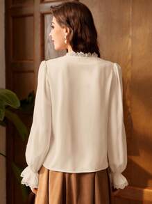 Vintamour Vintage Elegant Women's Shirt With Lace Patchwork, V-Neck, Long Flare Sleeves, Ruffle Hem And Exquisite Pearl Button, Perfect For Work Back To School Clothes Fall Clothes Women Blouses Fall Tops Fall Outfits Teacher Clothes Winter Women Vintage Clothes White Long Sleeve Shirt Button Down Shirt Long Sleeve Top Renaissance Old Money Work Clothes Christmas Clothes Winter Tops Work Women Blouses Homecoming Birthday Women Outfits Cottage Core Fall Clothes Long Sleeve Blouse