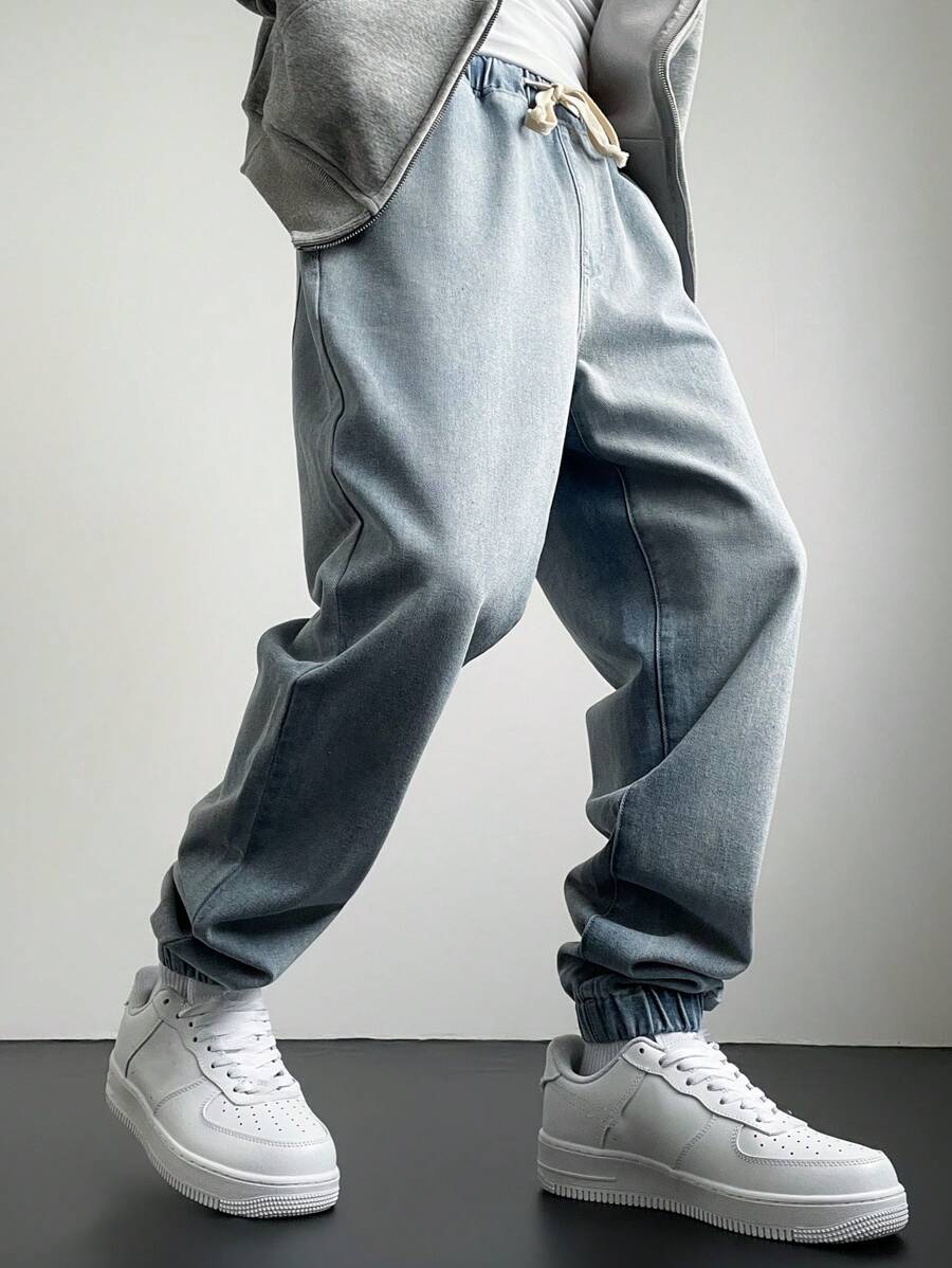 Manfinity Hypemode Pantalones vaqueros holgados tipo harem de color liso con cordón en la cintura para hombre, pantalones rectos largos desgastados de carga de color azul claro, regalos para esposo o novio - Azul - Ver 1