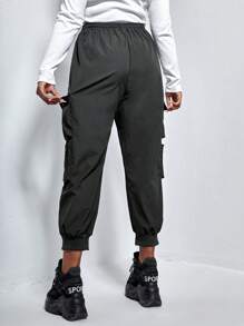 SHEIN EZwear Pantalones cargo negros de talla grande con bolsillo con solapa y cordón
