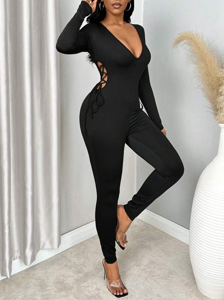 Zolique Black Ribbed Hollow Out Tie-Up Long Sleeve Jumpsuit | SHEIN