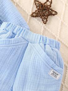 SHEIN 男婴/女婴新款春秋简约运动裤和长袖套装，男婴圆领插肩袖运动衫和裤子套装，韩式休闲透气四季服装，独特口袋设计柔软舒适耐穿裤子，柔软舒适亲肤纯色休闲婴儿服装，优质梭织面料 - 藍色 - 查看 6