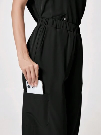 TaskEZ Pantalones de uniforme con cintura elástica de unicolor