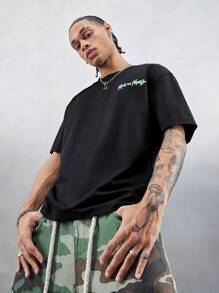 Rick and Morty X SHEIN Camiseta de manga corta holgada con estampado de personaje de dibujos animados y letras, de hombros caídos, casual, de verano para hombre