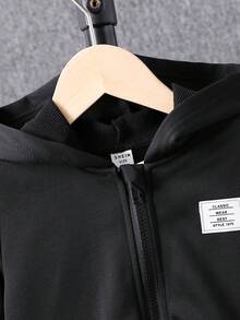 2 件套年轻男孩休闲运动黑色连帽夹克和运动裤套装，袖子和裤子上有撞色饰边，正面印有徽标，设计简约而优雅，适合秋冬穿着，经典搭配，秋冬必备服装，适合日常穿着和户外活动，连帽设计保暖 - 黑色 - 查看 3