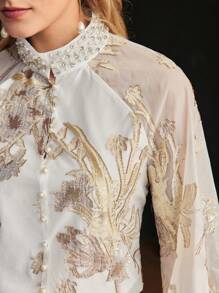 MOTF PREMIUM JACQUARD FLOWER APPLIQUE MOCK NECK FAUX PEARL AND RHINESTONE DETAIL BLOUSE