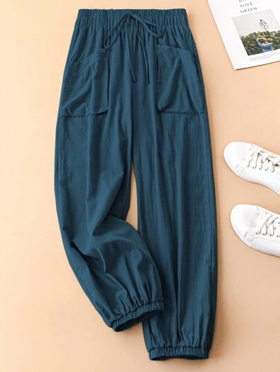 Plus Size Solid Color Front Tie Pocket Casual Pants