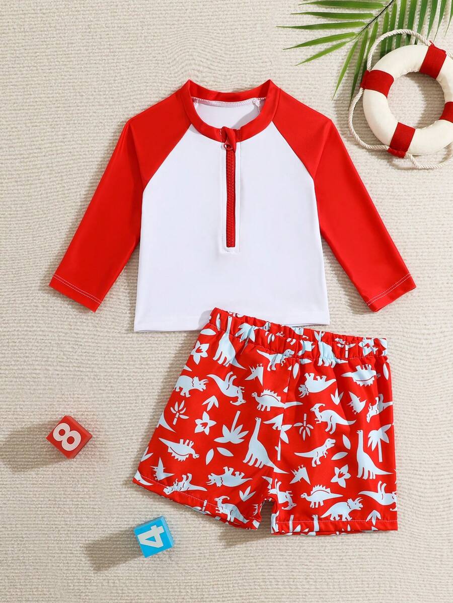 2 piezas Conjunto de traje de baño para niño bebé con parte superior de manga raglán de color contrastante y bóxer de natación con estampado de dinosaurio de dibujos animados para vacaciones de playa de verano - Multicolor - Ver 1