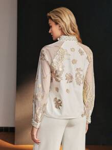 MOTF PREMIUM JACQUARD FLOWER APPLIQUE MOCK NECK FAUX PEARL AND RHINESTONE DETAIL BLOUSE