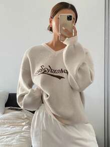 DAZY Suéter holgado de manga larga con cuello en V y estampado jacquard de letra para mujeres