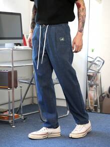 Claim Dot Herren Lockere, weite Ballonform Jeans mit Vintage-Waschung in Dunkelblau