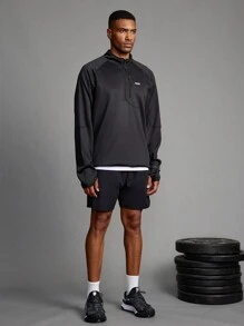 Manfinity Sport Corelite Herren Freundin Stil Shorts mit elastischem Bund, geometrischem Muster und Taschen, Lässig Fitness Shorts