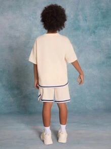 SHEIN Tween Boys' Knitted Solid Color Letter Printed Patchwork Woven Tape Short Sleeve T-Shirt And Shorts Set - Beige - View 3