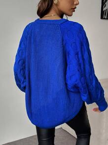 Chiquease Suéter de cuello alto azul marino bordado con cuentas