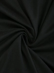 Flirla Mono negro de cuello alto con abertura, ceñido y con vuelo