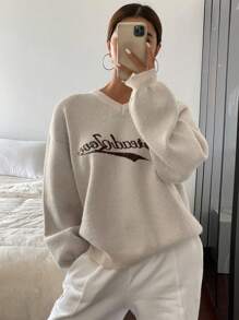 DAZY Suéter holgado de manga larga con cuello en V y estampado jacquard de letra para mujeres