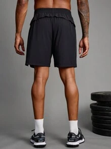 Manfinity Sport Corelite Herren Freundin Stil Shorts mit elastischem Bund, geometrischem Muster und Taschen, Lässig Fitness Shorts