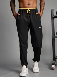 Manfinity Sport Streetwear Boyfriend Style Men's Contrast Color Patchwork Front Tie Pocket Minimalist Sports Pants