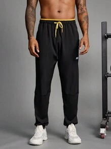 Manfinity Sport Streetwear Boyfriend Style Men's Contrast Color Patchwork Front Tie Pocket Minimalist Sports Pants