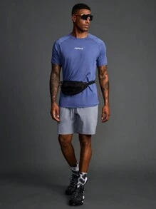 Manfinity Sport Polished Conjunto de camiseta de cuello redondo y manga raglán con estampado de letras y shorts holgados de estilo de novio, ropa deportiva y de gimnasio