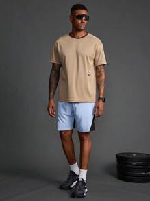 Manfinity Sport Corelite 男友风男士休闲松紧腰宽松运动短裤