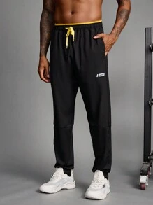 Manfinity Sport Streetwear Boyfriend Style Men's Contrast Color Patchwork Front Tie Pocket Minimalist Sports Pants
