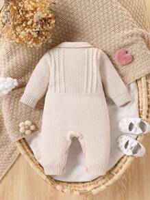 Mono de punto de moda y lindo todo a juego para niña bebé, mono de una sola pieza de manga larga blanco con diseño simple pero elegante con decoración de lazo negro en el pecho
