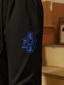 Manfinity Sport Corelite Pantaloni de trening casual relaxați pentru bărbați, stil boyfriend, cu buzunar cu imprimeu cu litere