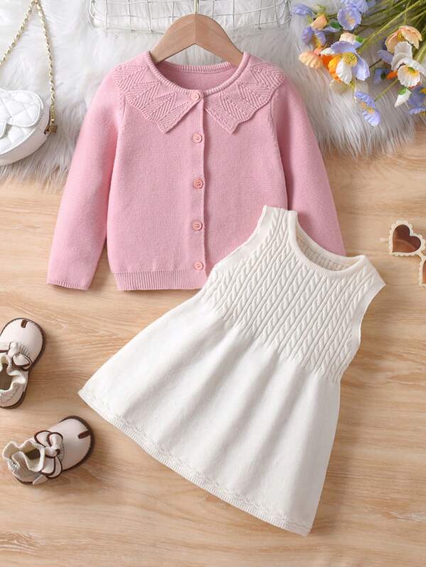 2pcs Knitted Sweater Set For Baby Girls, Autumn/Winter. This Baby Girl Sweater Set Exudes A Sweet And Adorable Style, Including A Large Lapel Cardigan And A Round Neck Dress. The Pink And White Color Combination Adds A Playful And Warm Touch. The Cardigan Features A Large Lapel Design, Which Is Both Warm And Stylish, While The Round Neck Dress Is Simple And Cute, Suitable For Baby Girls To Wear. The Fabric Is Chosen For Its Comfort And Breathability, Ensuring The Baby's Comfort. The Special Fabric Further Highlights The Set's Refined Quality, Showcasing The Craftsmanship And Attention To Detail. This Sweater Set Is Suitable For Various Occasions, Such As Family Gatherings, Holiday Celebrations, Or Everyday Wear, Allowing The Baby Girl To Exude A Playful And Cute Image. The Overall Design Is Simple And Elegant, Focusing On Both Fashion And The Baby's Comfort, Making It An Ideal Choice. Suitable For Home, Outings, Holiday Parties, Christmas, Halloween, Etc