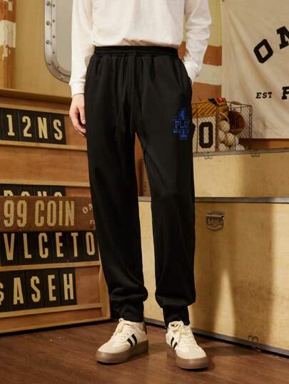 Manfinity Sport Corelite Pantalones de chándal rectos y relajados con estampado de letras en el bolsillo, estilo novio