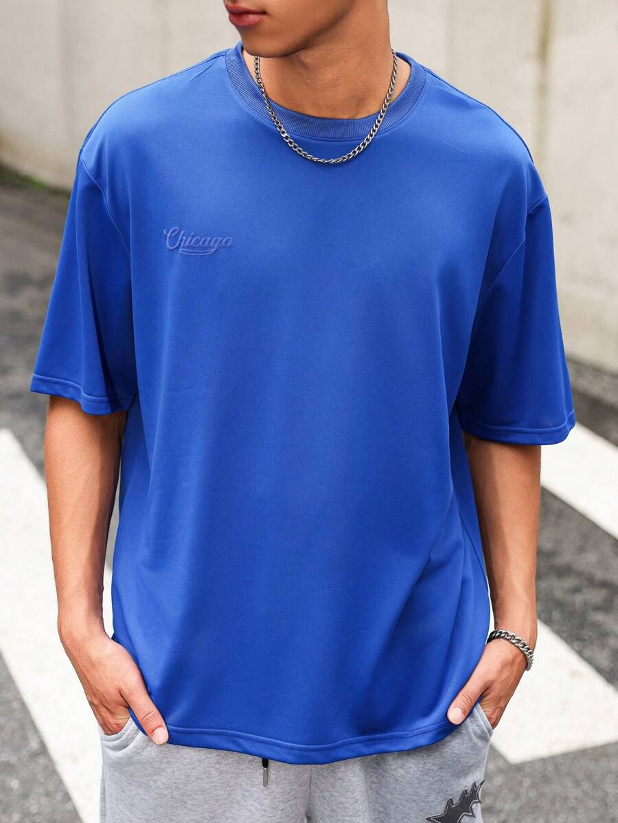 Manfinity Roghcode Oversized Men's Slogan & Figure Graphic Drop Shoulder T-Shirt - Blue - View 1