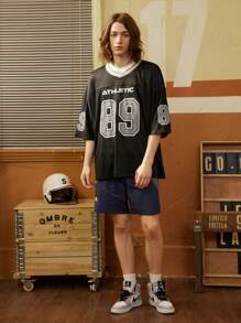 Manfinity Sport Corelite Short style boyfriend décontracté pour hommes avec bords contrastés. Tenue de sport et de plein air, short de retour à l'école, tenue de gym, tenue de randonnée, sous-chemise courte