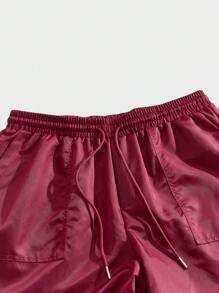 Forever 21 Pantalón cargo holgado para hombre con cintura elástica en color borgoña - Burdeos - Ver 7