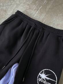 Manfinity EMRG 男士字母与火焰印花抽绳腰宽松休闲运动裤，外出时尚长款宽松喇叭色块运动裤，适合丈夫、男朋友的礼物 - 黑色 - 查看 4