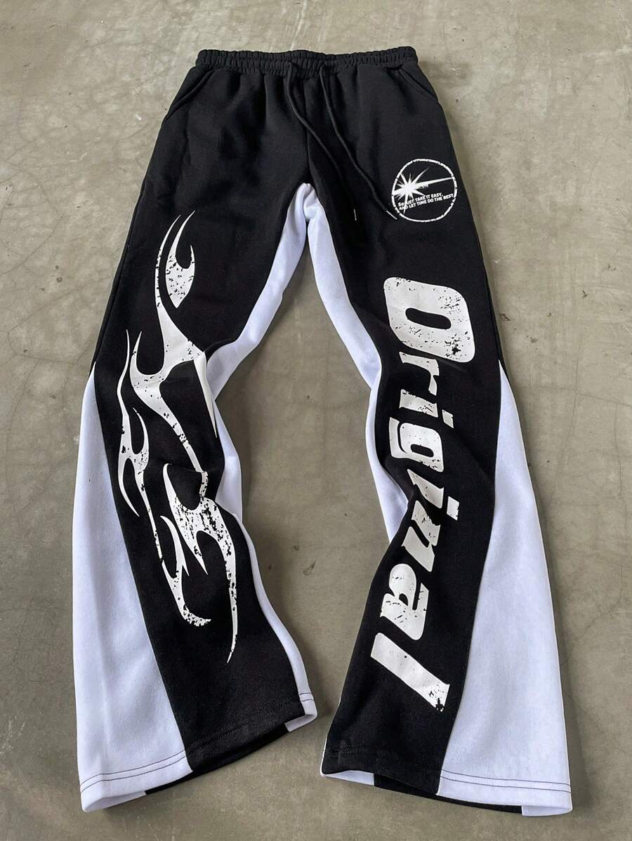 Manfinity EMRG 男士字母与火焰印花抽绳腰宽松休闲运动裤，外出时尚长款宽松喇叭色块运动裤，适合丈夫、男朋友的礼物 - 黑色 - 查看 1