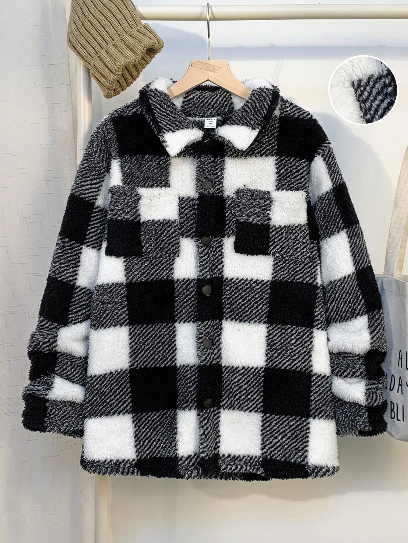 SHEIN جاكيت كاجوال فضفاضة ذات وبر طويلة الأكمام، ي...