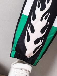 SHEIN 1 pieza Pantalones informales con cordón y puños para niños pequeños, con diseño de bloques de color, numérico y calavera, cómodos y transpirables para uso diario, juegos al aire libre, ir a la escuela y fiestas de otoño/invierno y Halloween