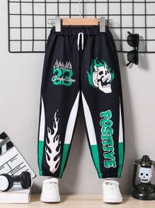 SHEIN 1 pieza Pantalones informales con cordón y puños para niños pequeños, con diseño de bloques de color, numérico y calavera, cómodos y transpirables para uso diario, juegos al aire libre, ir a la escuela y fiestas de otoño/invierno y Halloween