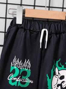 SHEIN 1 pieza Pantalones informales con cordón y puños para niños pequeños, con diseño de bloques de color, numérico y calavera, cómodos y transpirables para uso diario, juegos al aire libre, ir a la escuela y fiestas de otoño/invierno y Halloween