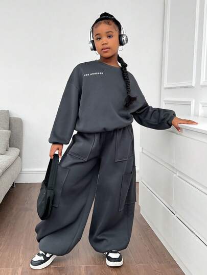 Conjunto informal de niña preadolescente con sudadera con capucha oversize y pantalón de chándal de forro polar con cordón en la cintura, diseño con estampado reflectante