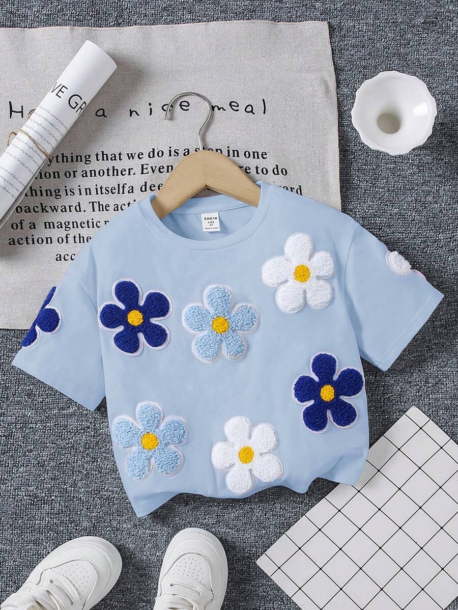 SHEIN 年轻女孩宽松可爱花卉印花短袖圆领垂肩 T 恤