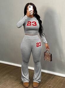 Slaydiva Bộ 2 món đơn giản, thường ngày, gồm áo croptop cổ tròn và quần ống loe in số 23, dành cho nữ. - Hồng - Xem 7