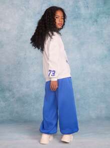 SHEIN 2 piezas Conjunto de niña preadolescente con camiseta de manga caída de unicolor con letras y patrones, y pantalones con cordón - Azul y blanco - Ver 2