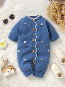 Pagliaccetto in maglia semplice con stampa floreale, con bottoni sul davanti e bordo a conchiglia, maniche corte, per bambina