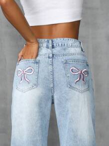 Rivivi 正面有纽扣、多个口袋、蝴蝶结刺绣、洗水牛仔裤