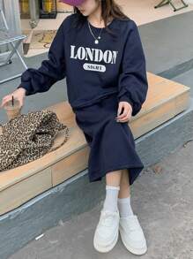 DAZY Bộ 2 món gồm áo nỉ cổ tròn in chữ và chân váy chữ A màu trơn dành cho nữ, bộ đồ mặc nhà giữ ấm mùa thu cho nữ. - Màu xanh hải quân - Xem 5