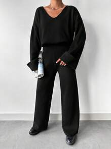 EURMUSE Women's Solid Color V-Neck Drop Shoulder Long Sleeve Sweater And Knit Pants Casual 2-Piece Set, Autumn/Winter - Black - View 3