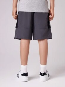 SHEIN Shorts de malla con diseño sólido y estampado de letras para niño preadolescente, con bolsillos y ajuste holgado - Multicolor - Ver 2