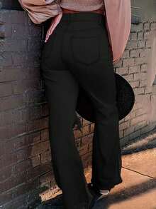 Jeans a vita alta neri con bottoni, stile flare alla moda, adatti per uscite casual